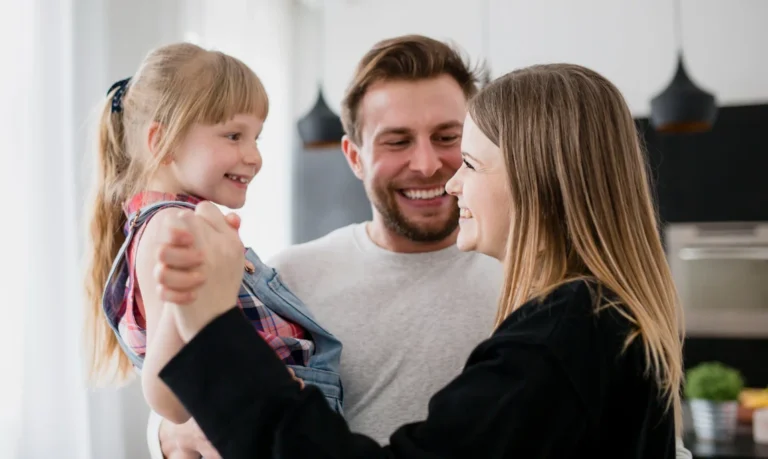 A happy family hug each other
